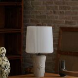 Modern vintage French table lamp, made of stone with fish patterns, 1970s.