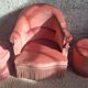 Set of crapaud armchair and 2 Napoleon III pink velvet poufs from the 19th century.
