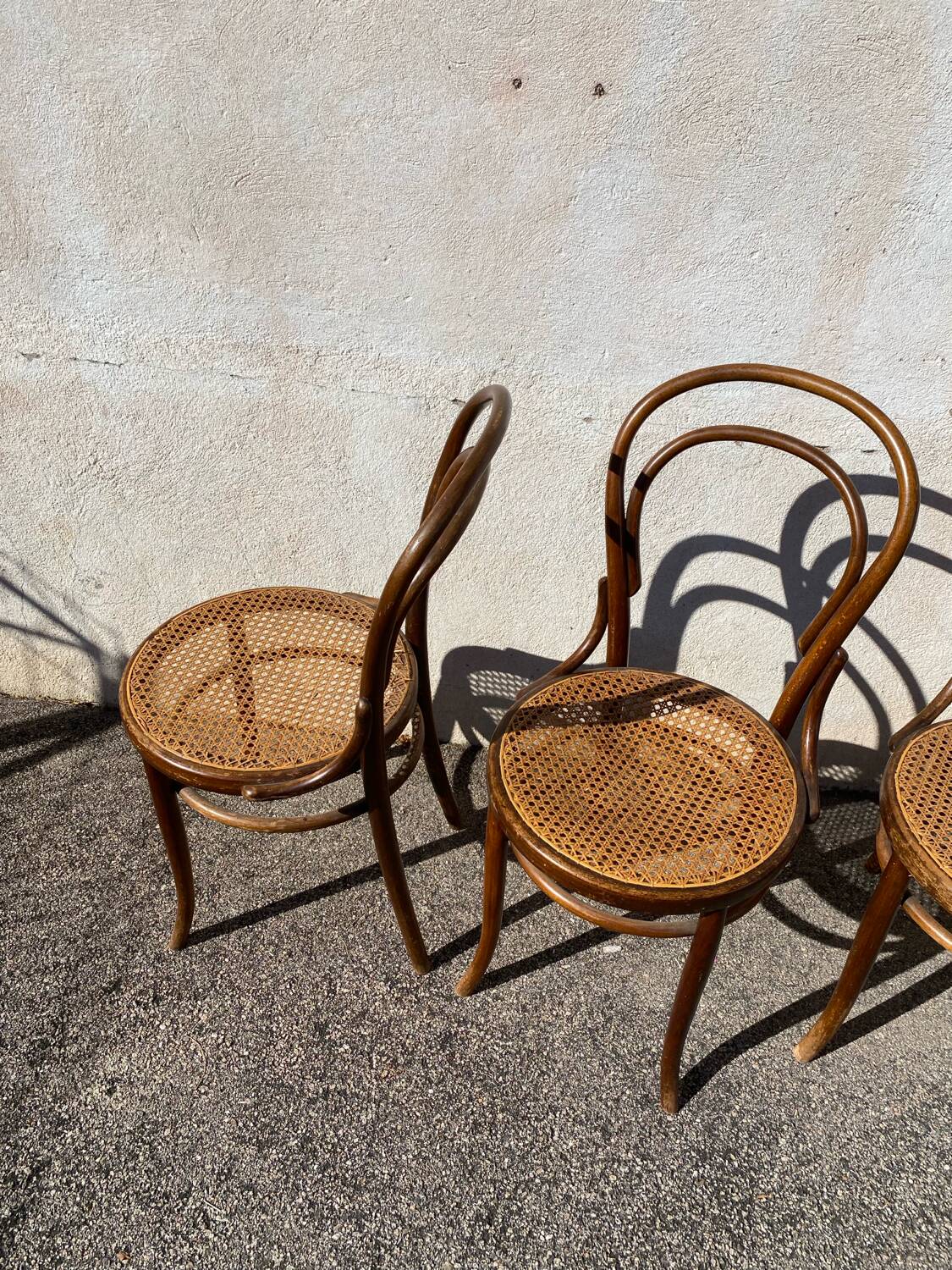 Set of 4 wooden and cane bistro chairs