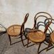 Set of 4 wooden and cane bistro chairs