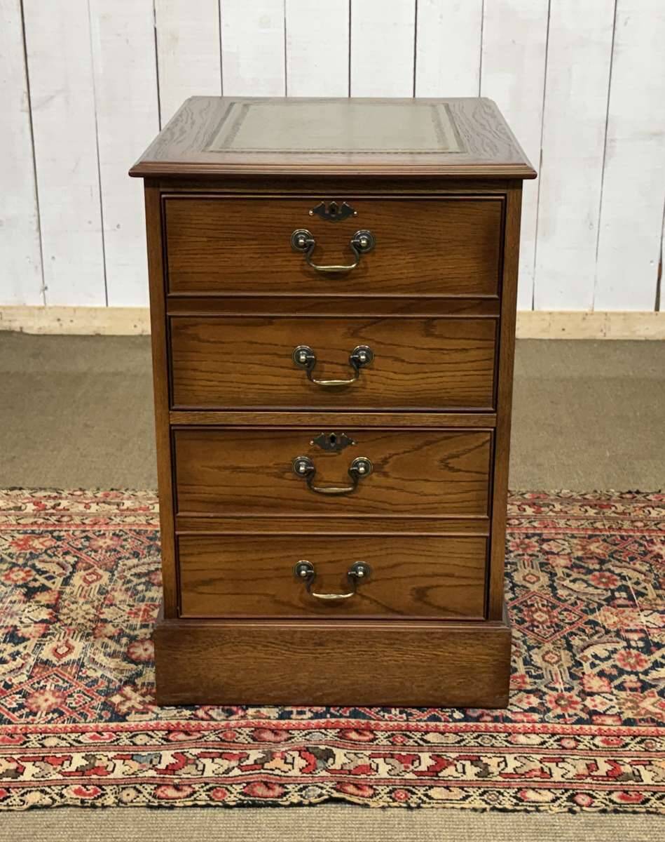 Office cabinet in oak with English leather top from the 1990s.