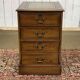 Office cabinet in oak with English leather top from the 1990s.