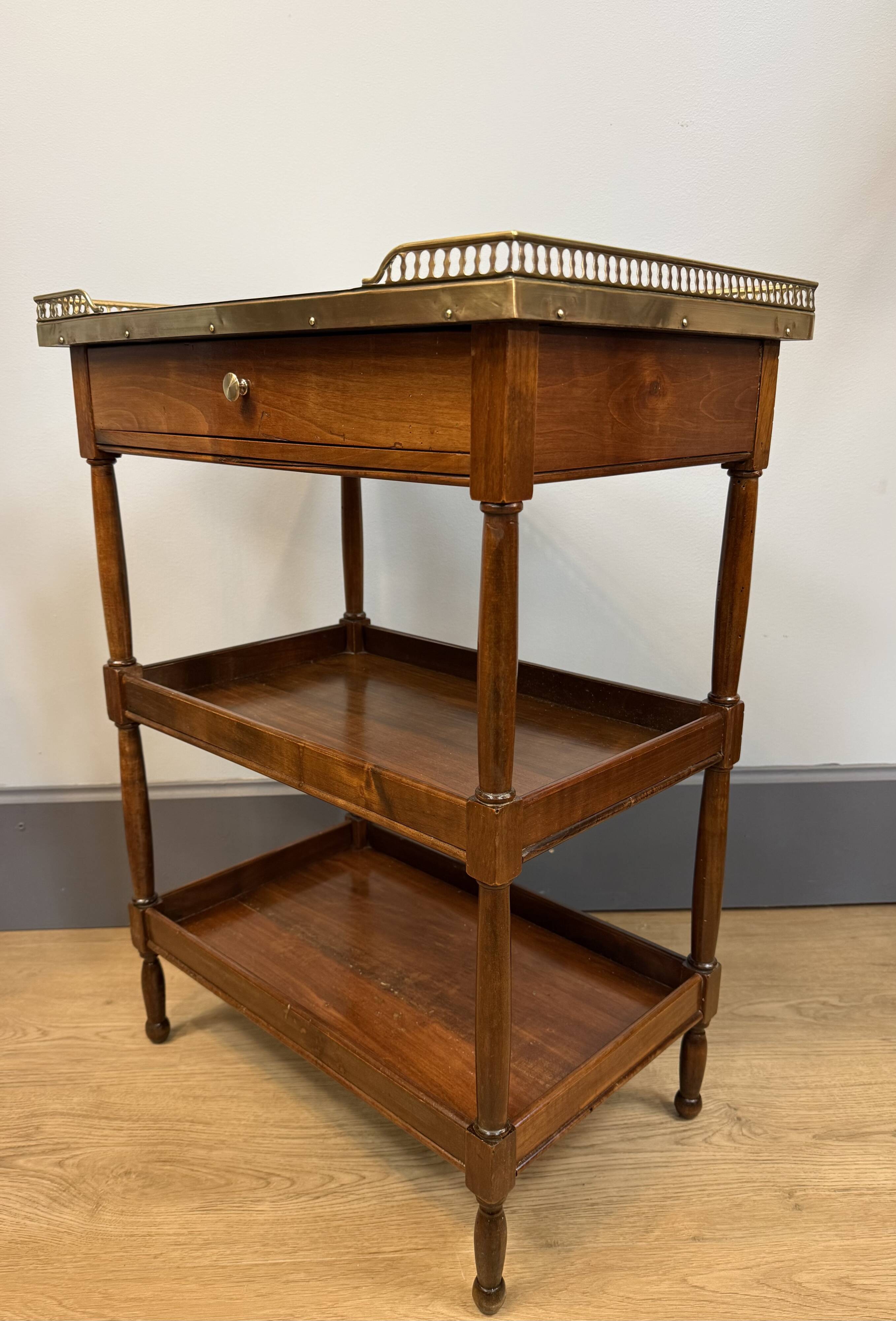 Small mahogany side table in Louis XVI style.