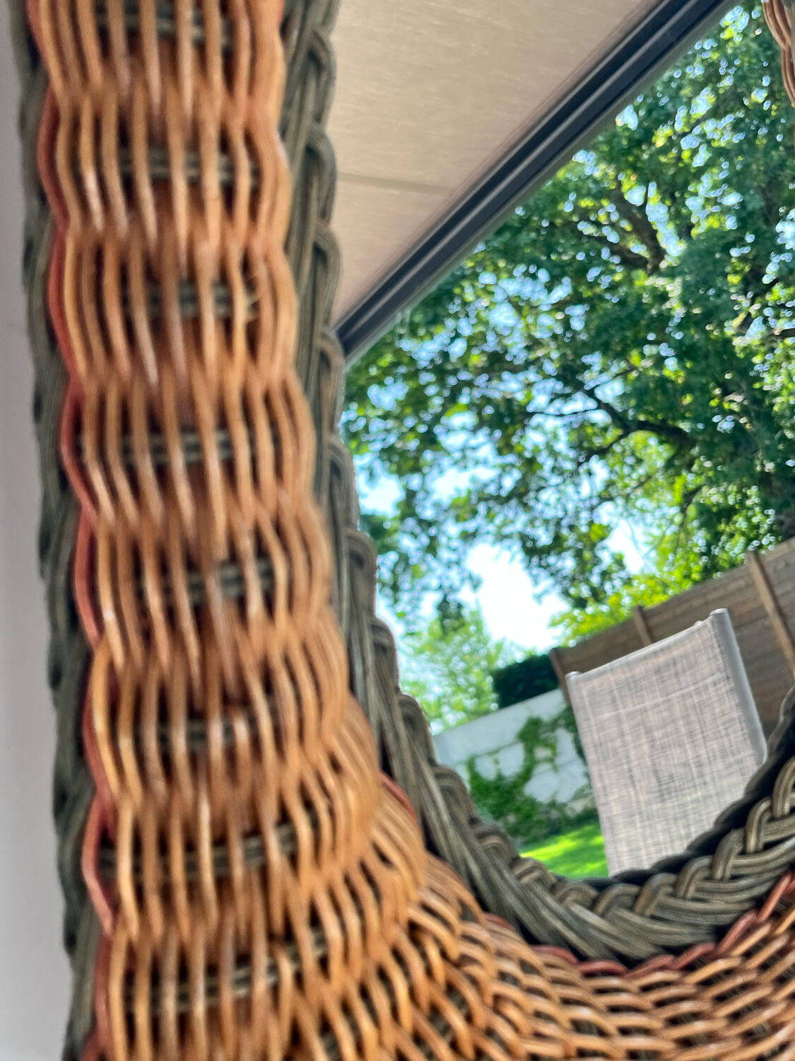 Oval wicker mirror