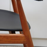 Vintage armchair in teak and black leather model Casina 60s