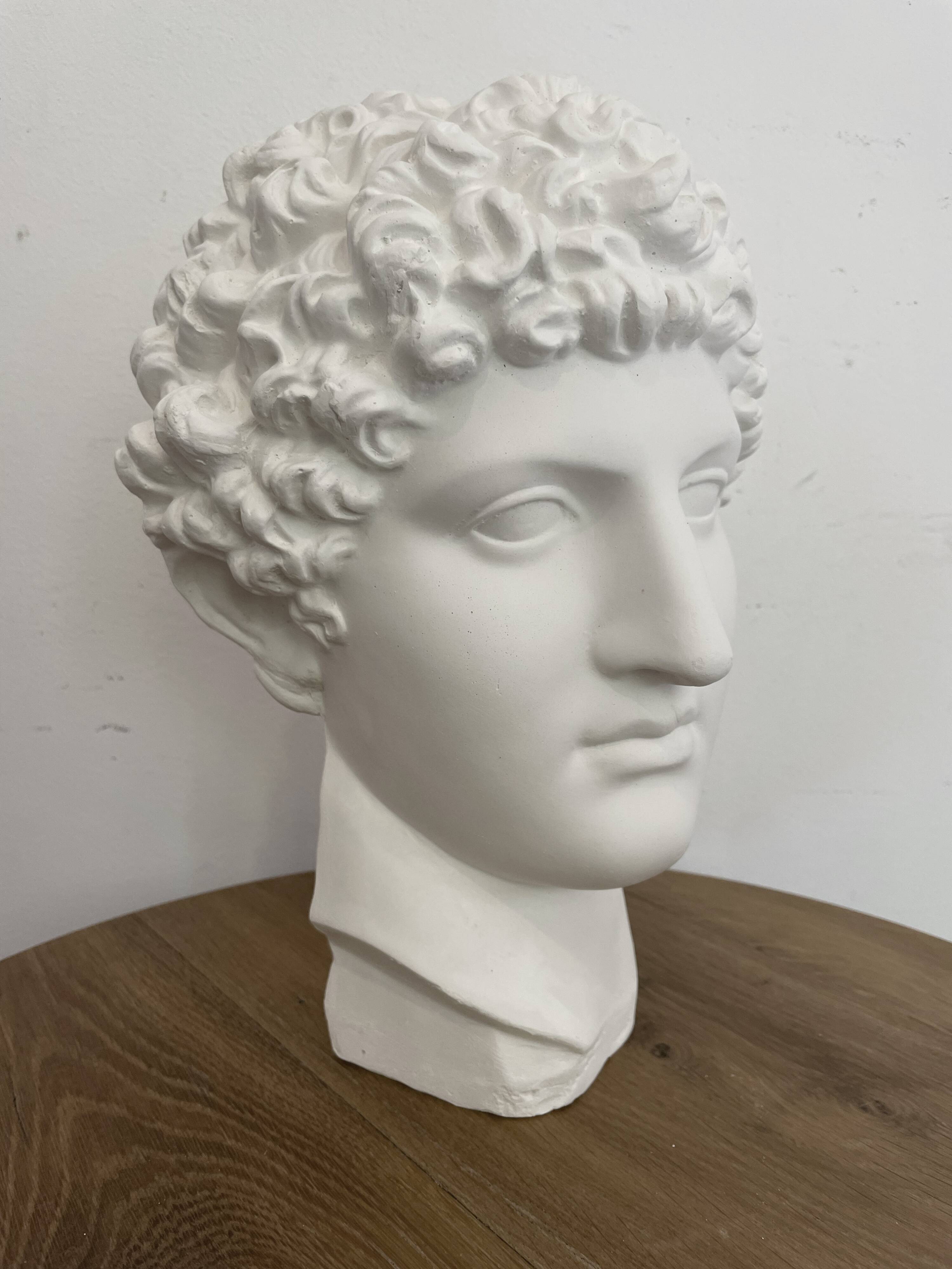 White plaster Greek head