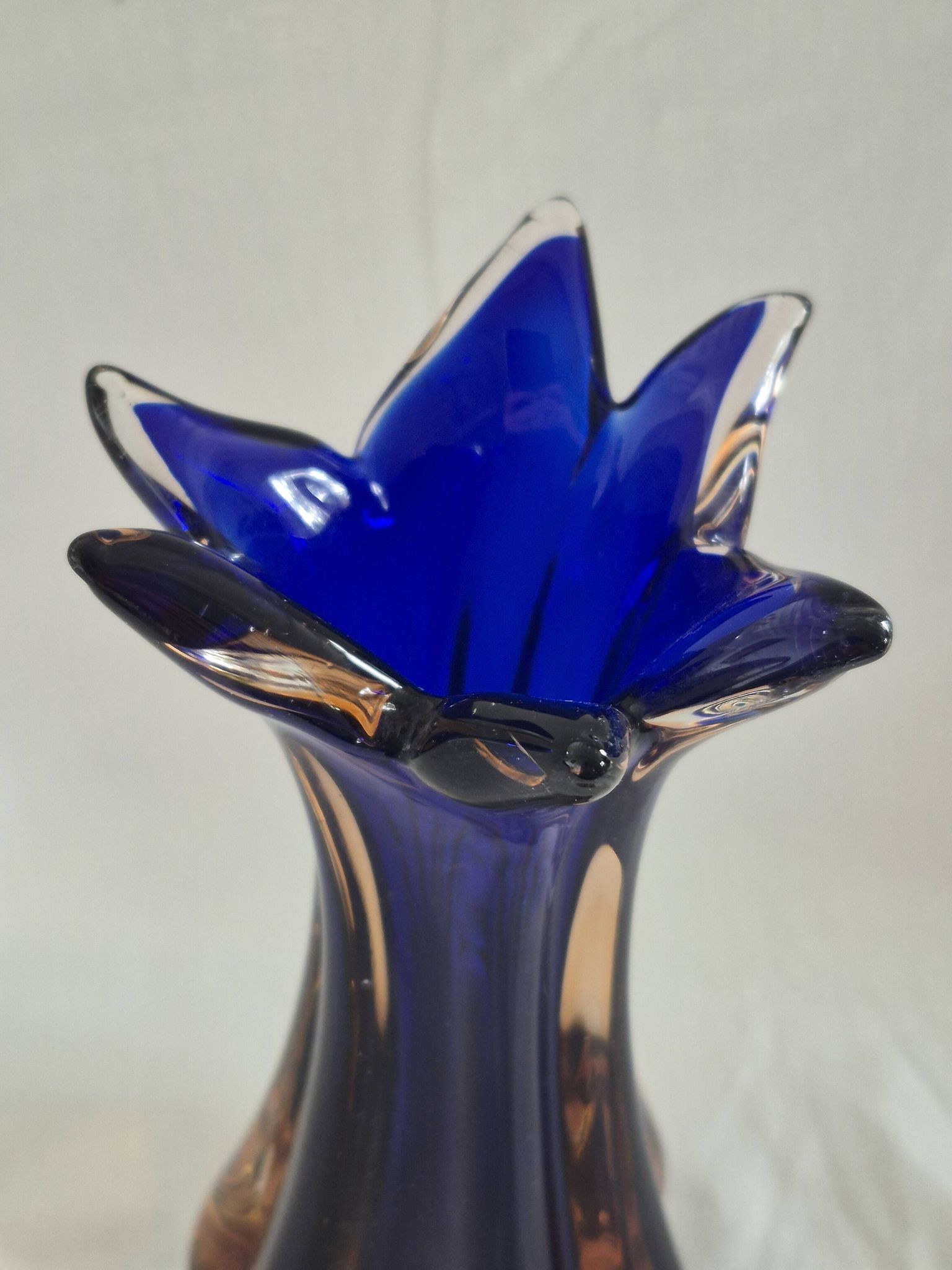 Vintage cobalt blue and amber blown glass vase in Murano style.