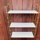 Vintage modular wall shelf, metal and brass, circa 1960s