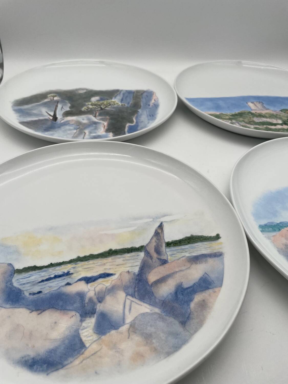 Hand painted porcelain plate with landscape decoration