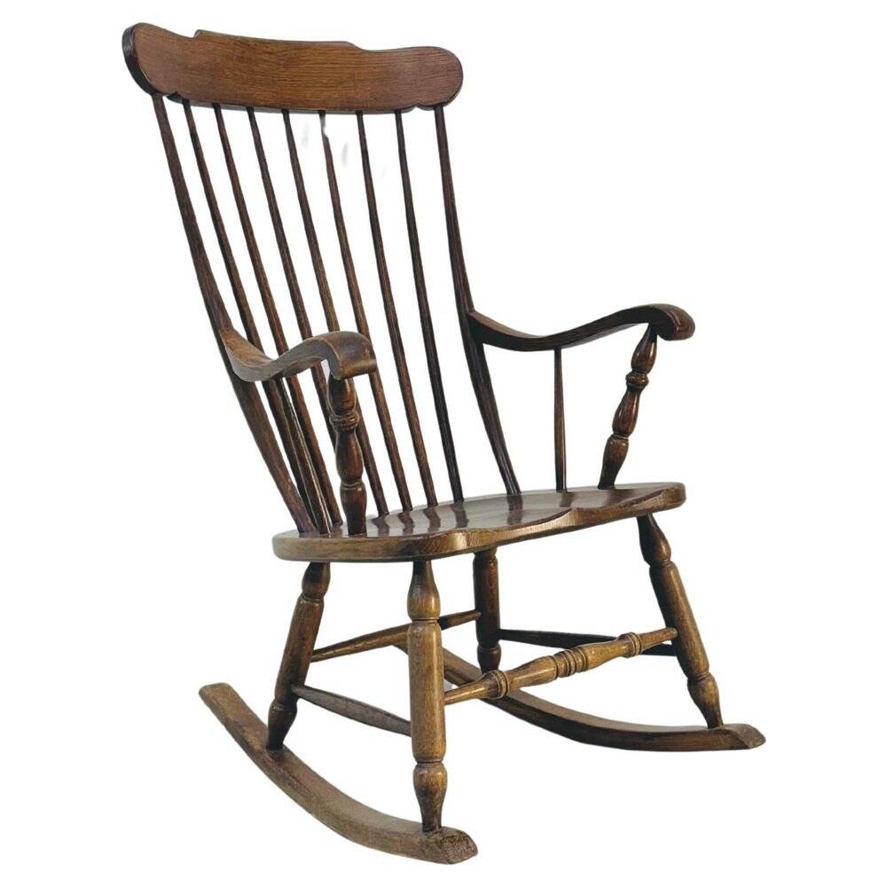 Vintage rocking chair in oak by Den Ouden, The Netherlands, 1975.