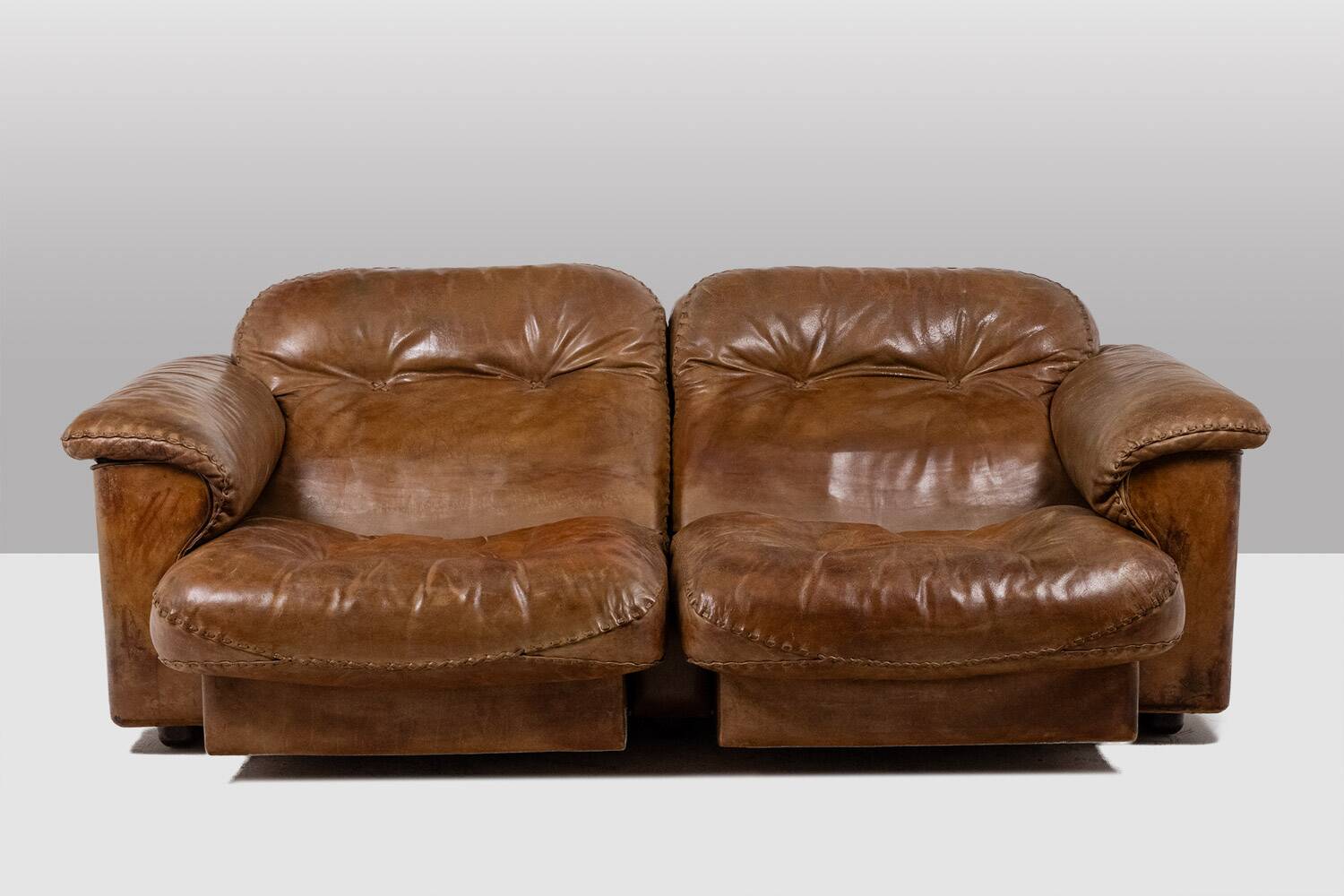 Maison De Sede. Two-seater sofa in buffalo leather. 1970s.