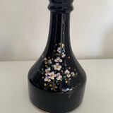 Black vase with flowers