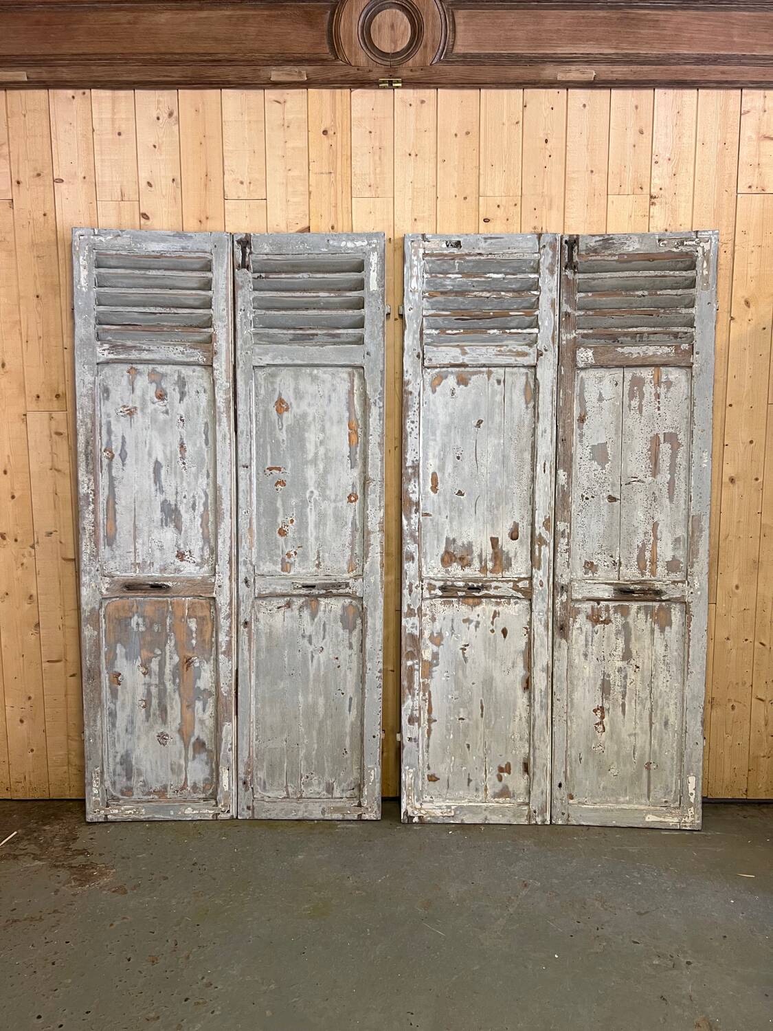 Pair of patinated gray shutters
