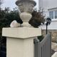 Pair of garden vases in reconstituted stone, Médicis shape, patinated.