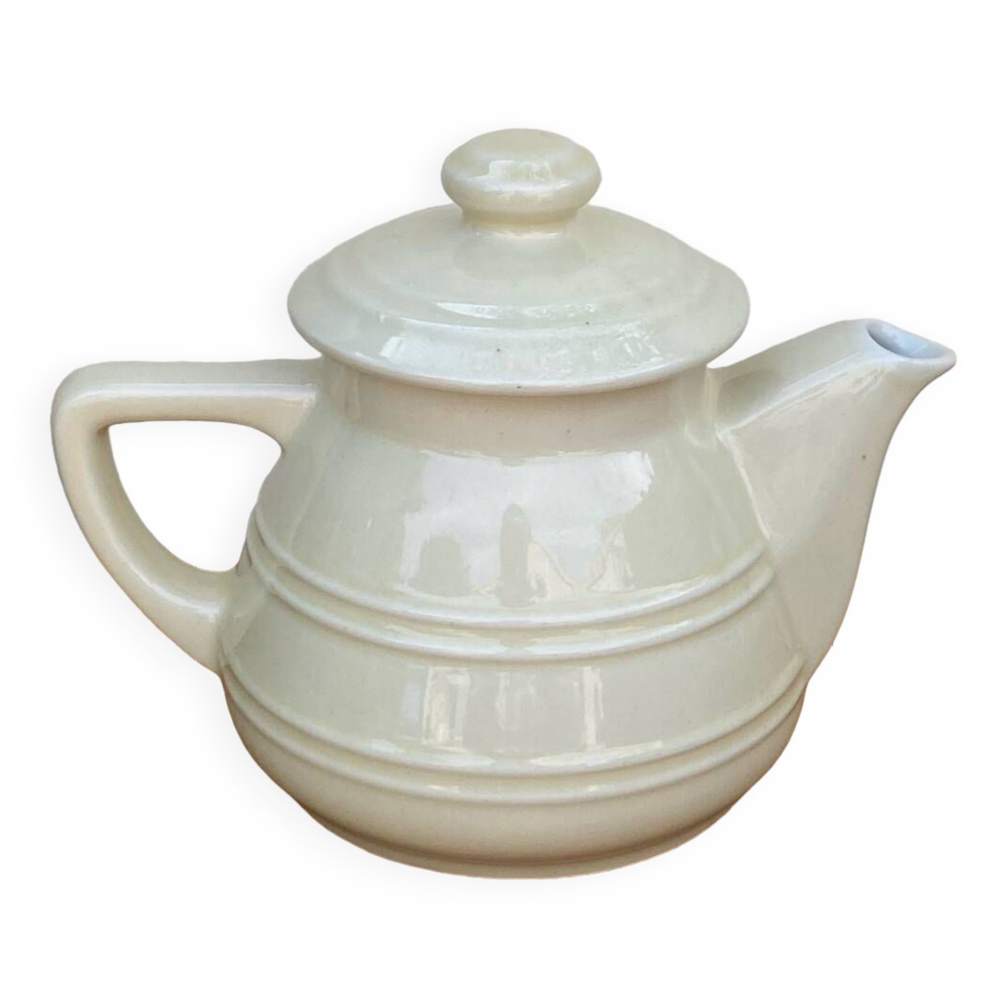 White ceramic teapot