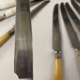 11 Art Deco knives, Bakelite and silver plated in a box