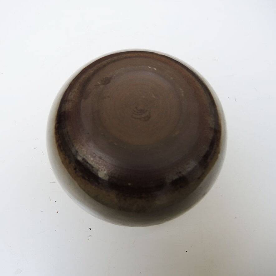 Ancient round stoneware vase
