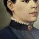 Oil on canvas portrait in an antique gilded wooden frame.