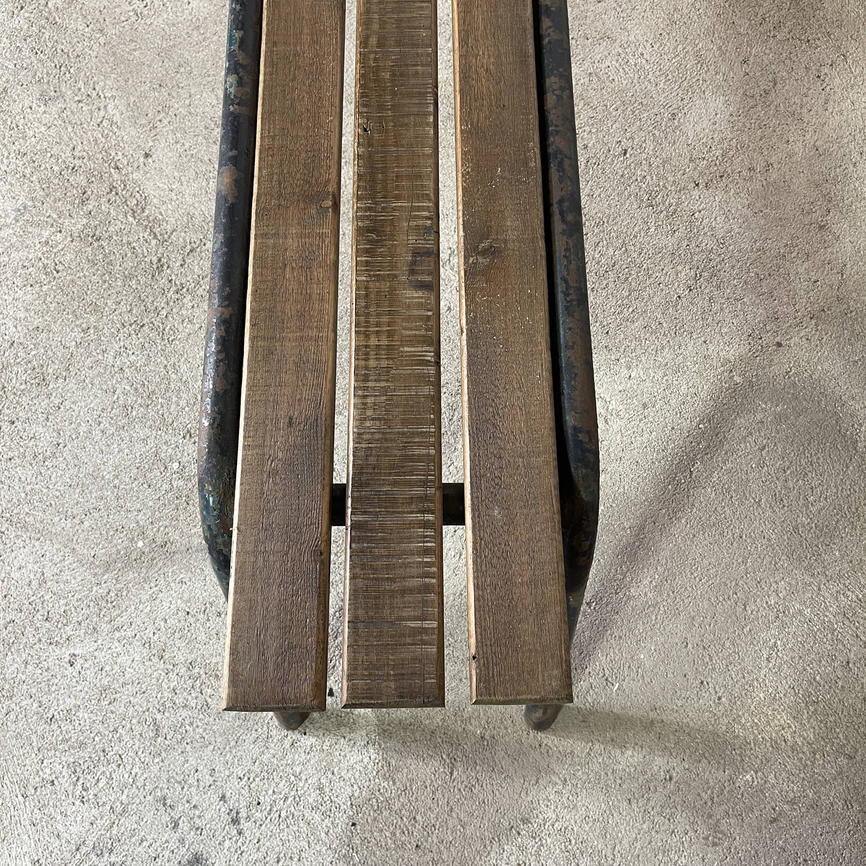 Old bench in steel and wood