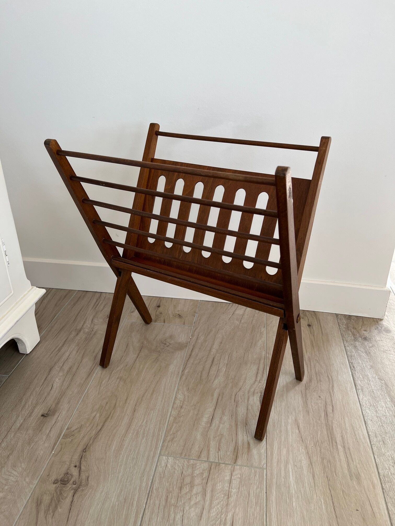 Folding magazine door