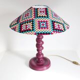 Table lamp in turned wood and printed conical shade