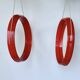 Pair of vintage round red plastic mirrors