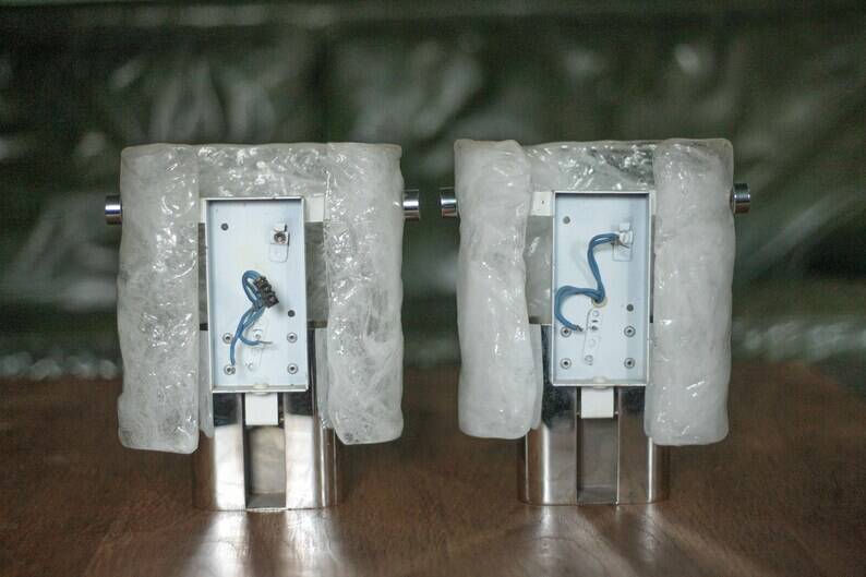 Pair of chrome wall sconces with Murano glass, wall light, art of glass, interior decoration.