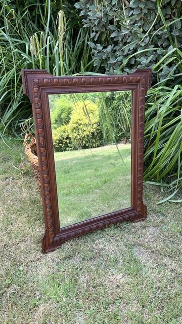 Antique carved wooden mirror