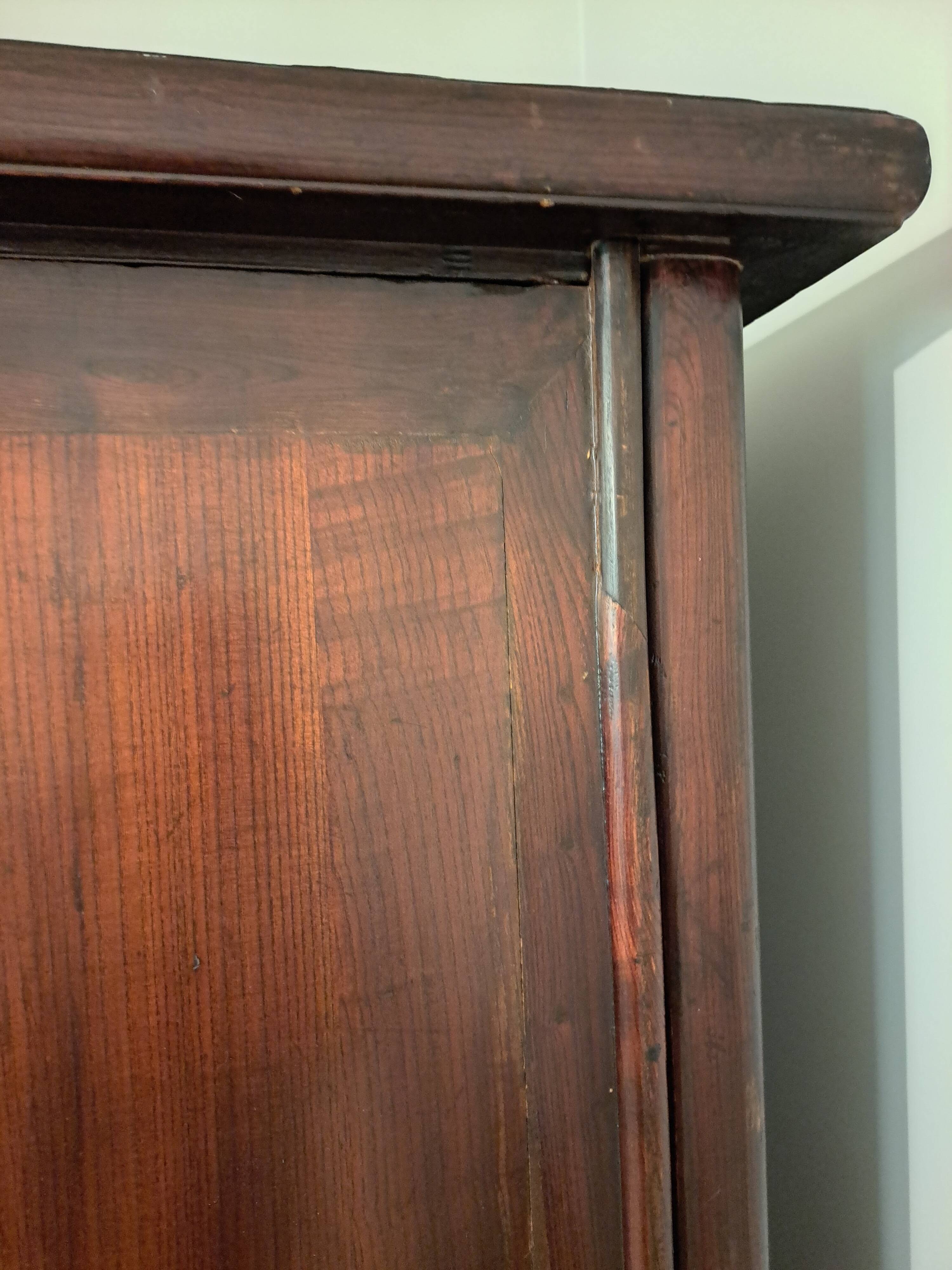 Brown lacquered Chinese wardrobe from Shandong.