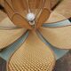 Lotus flower suspension in vintage cannage