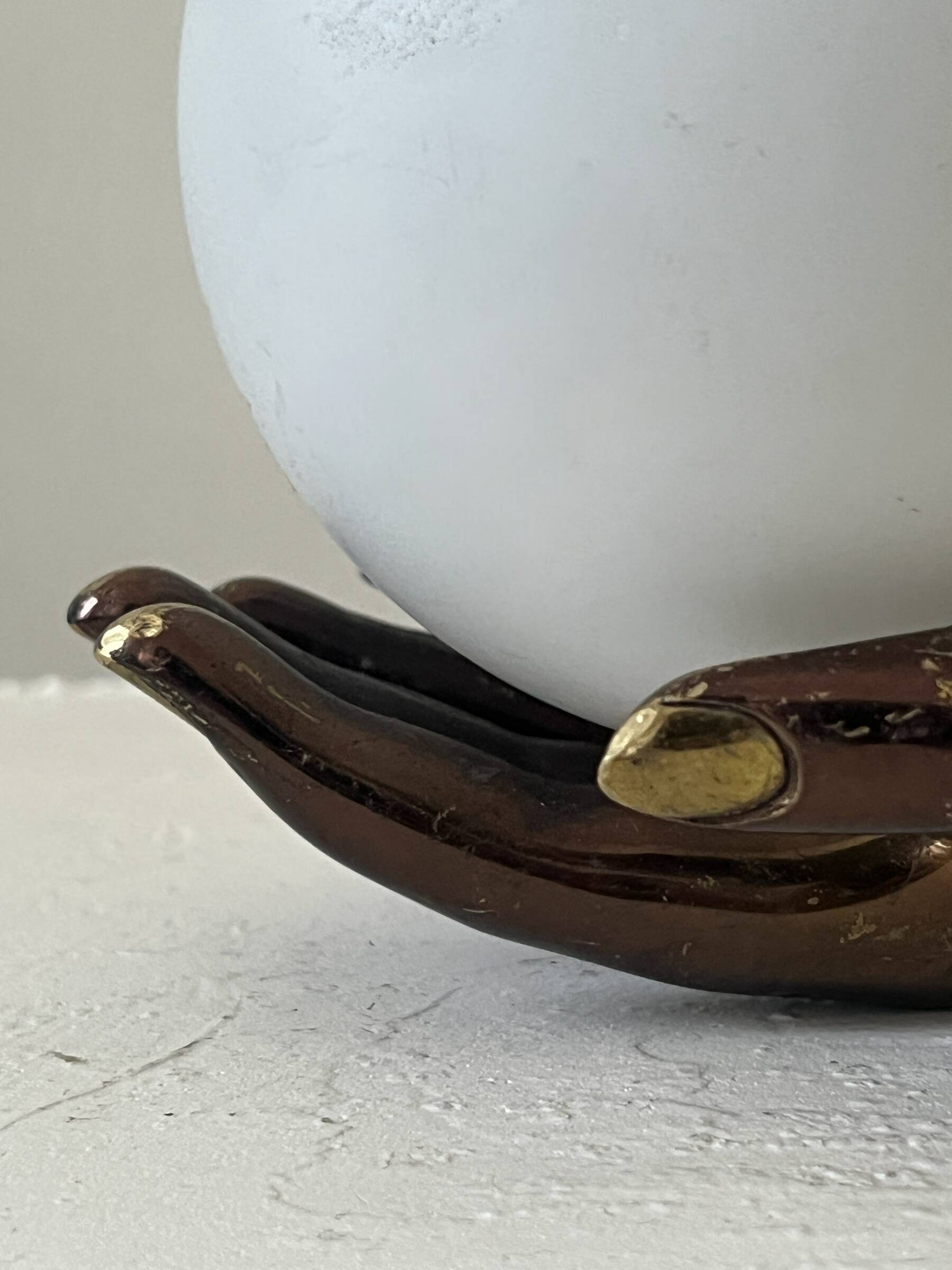Vintage table lamp hand-crafted in bronze with an opaline globe, Maison Arlus 1970.