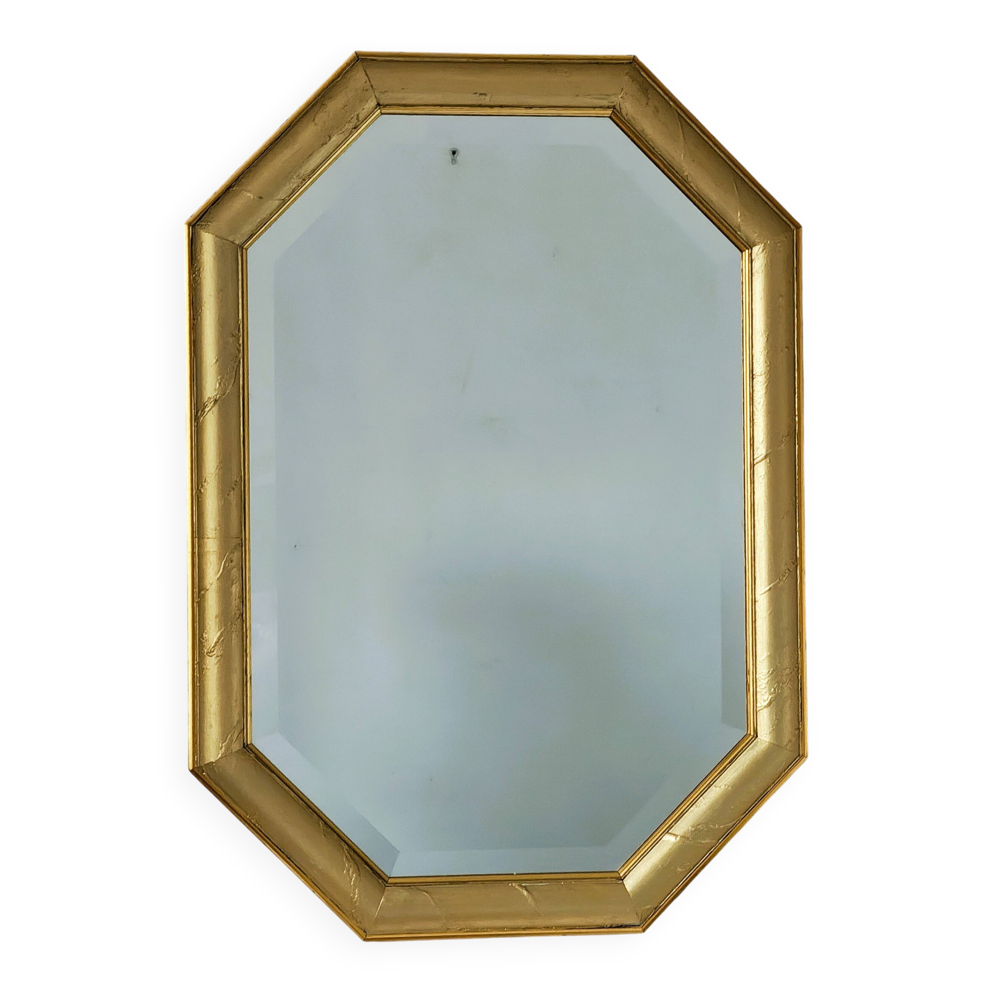 Golden octagonal mirror with bevelled glass from the 1970s.