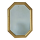 Golden octagonal mirror with bevelled glass from the 1970s.