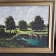 Antique oil painting depicting a countryside landscape