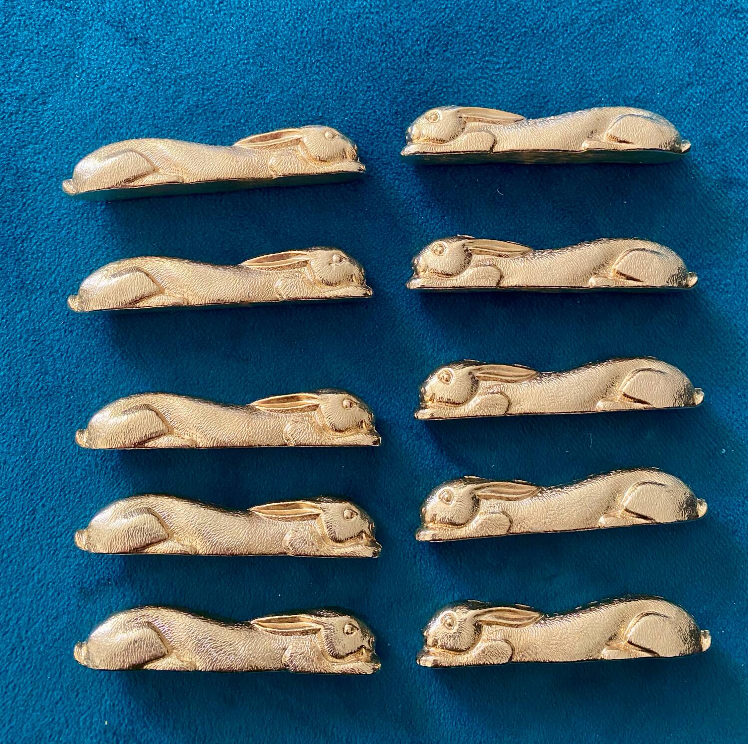 10 rabbit-shaped gold knife holders