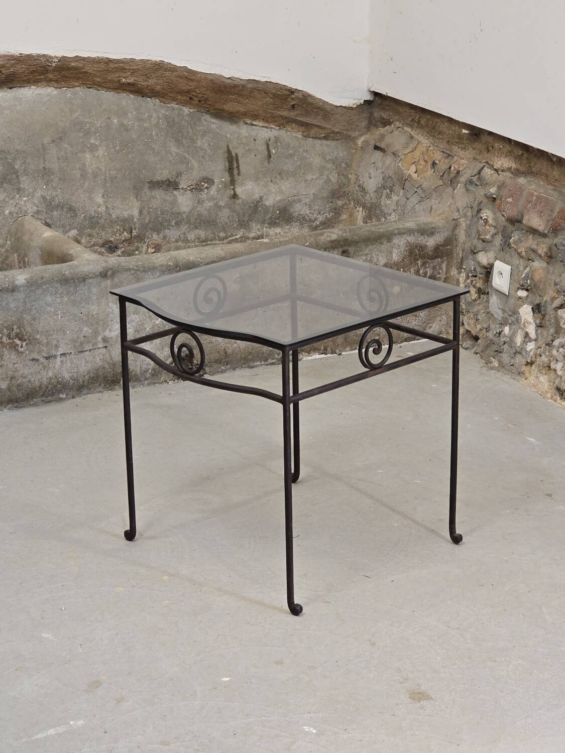 Small side table in wrought iron and smoked glass