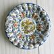Hand painted decorative dish with floral motifs