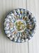 Hand painted decorative dish with floral motifs