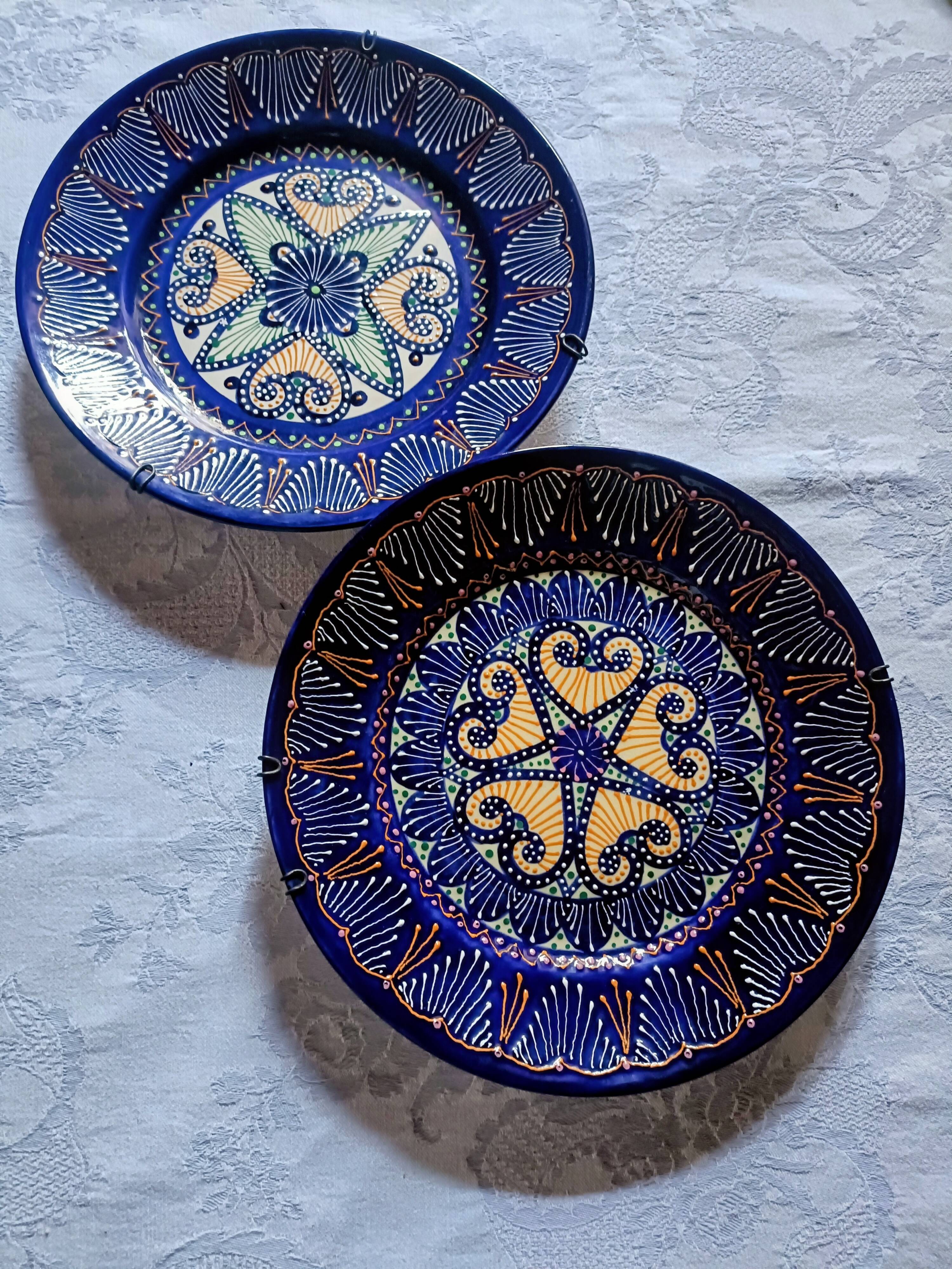 Two HB Quimper faience plates with pearl/embroidery decoration.