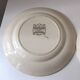 8 Terre de Fer dessert plates, 19th century