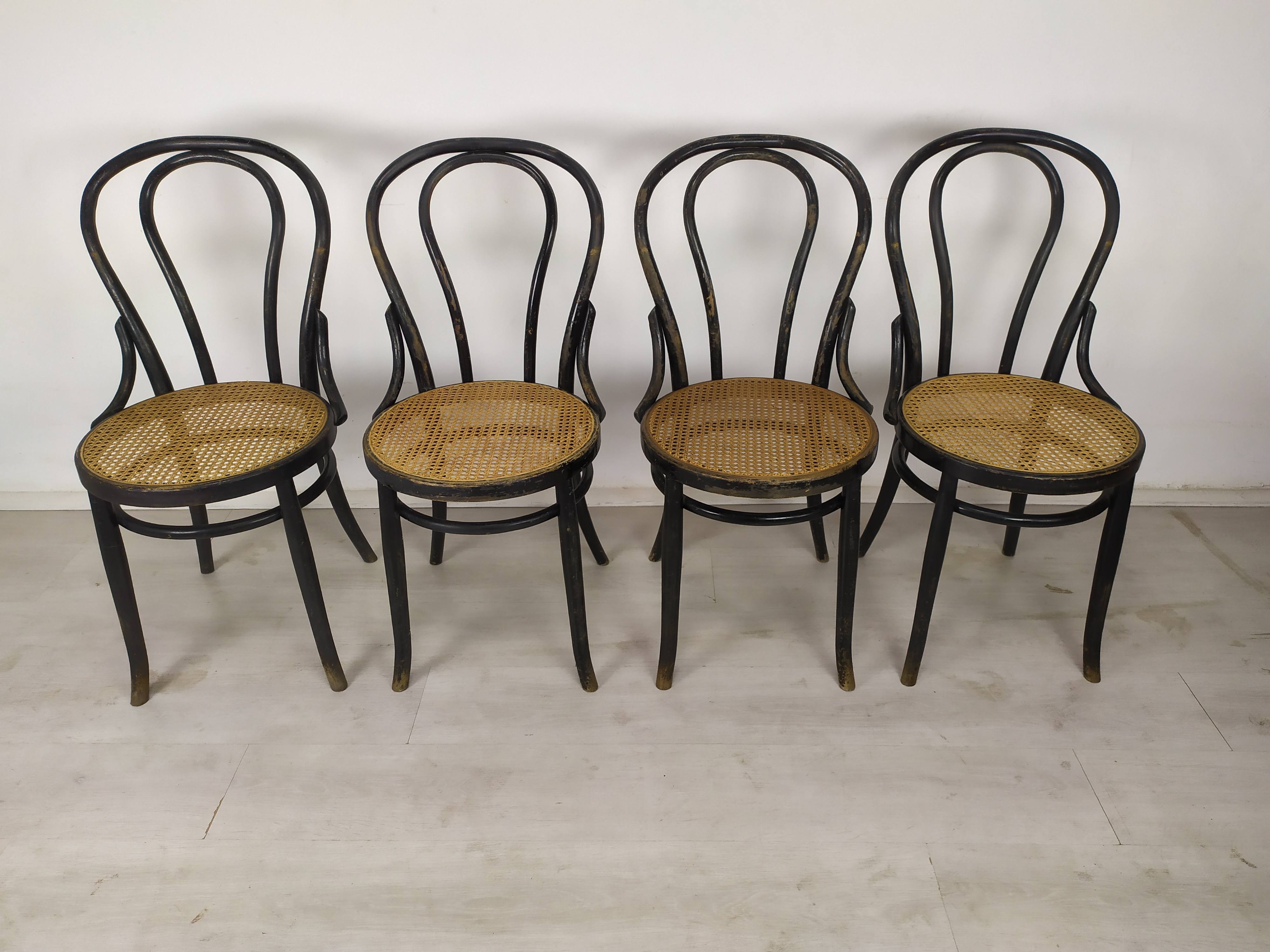Black canned bistro chairs