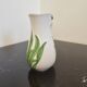 Vase in slipware with Arum flowers
