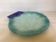 Blue glass paste pocket emptier