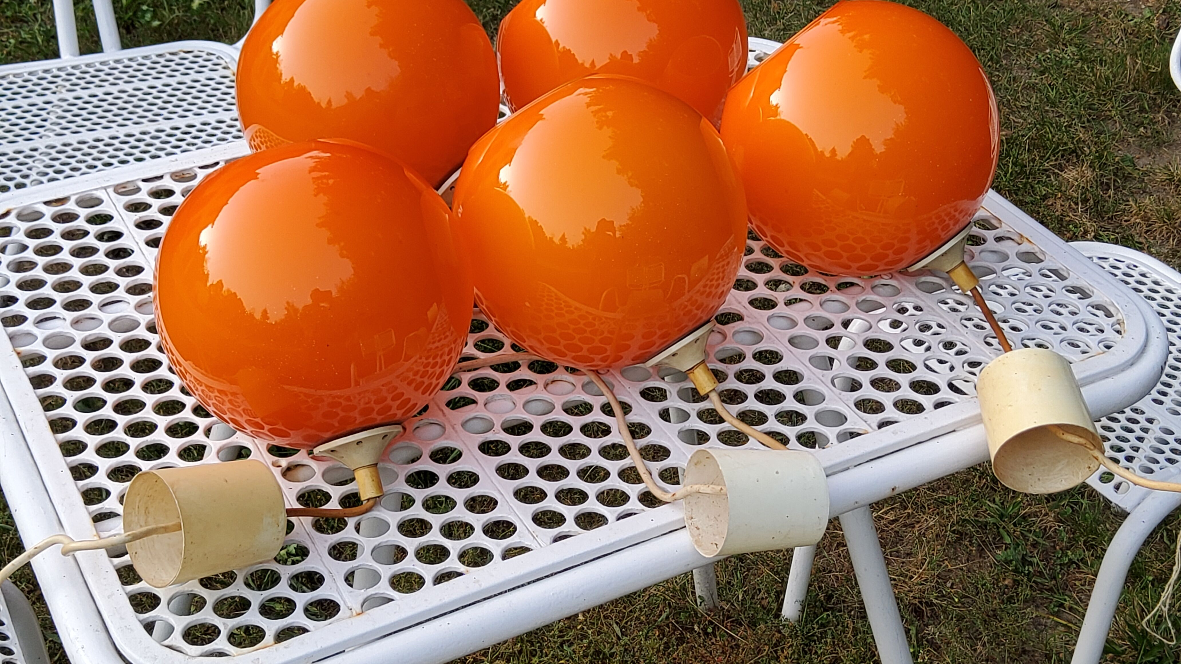 Set of 5 orange glass ball pendants from the 70s