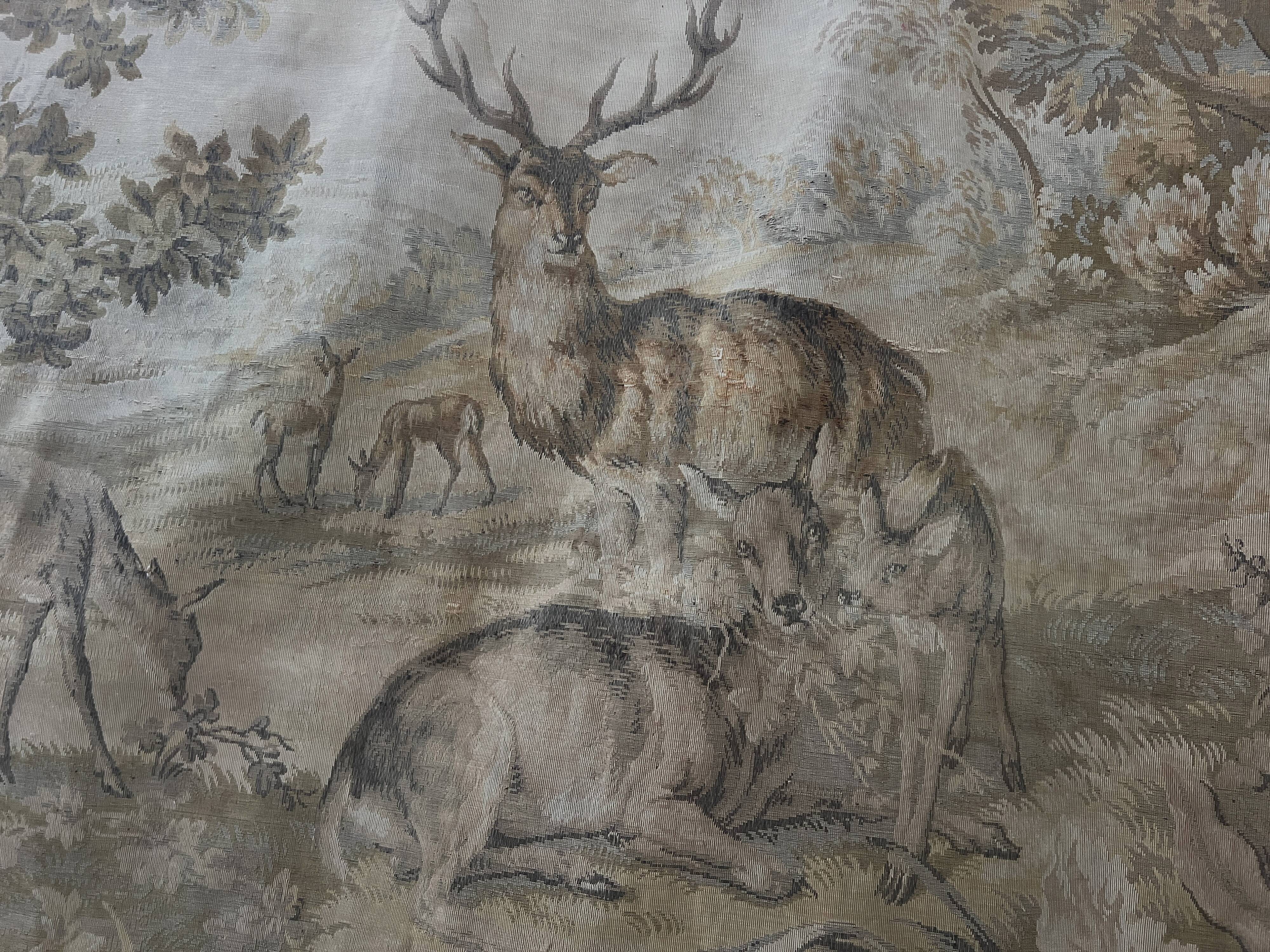 Renaissance-style tapestry with animal motifs, 20th century.