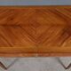 Small desk table in rosewood and rosewood marquetry, Louis XVI style – early 20th century.
