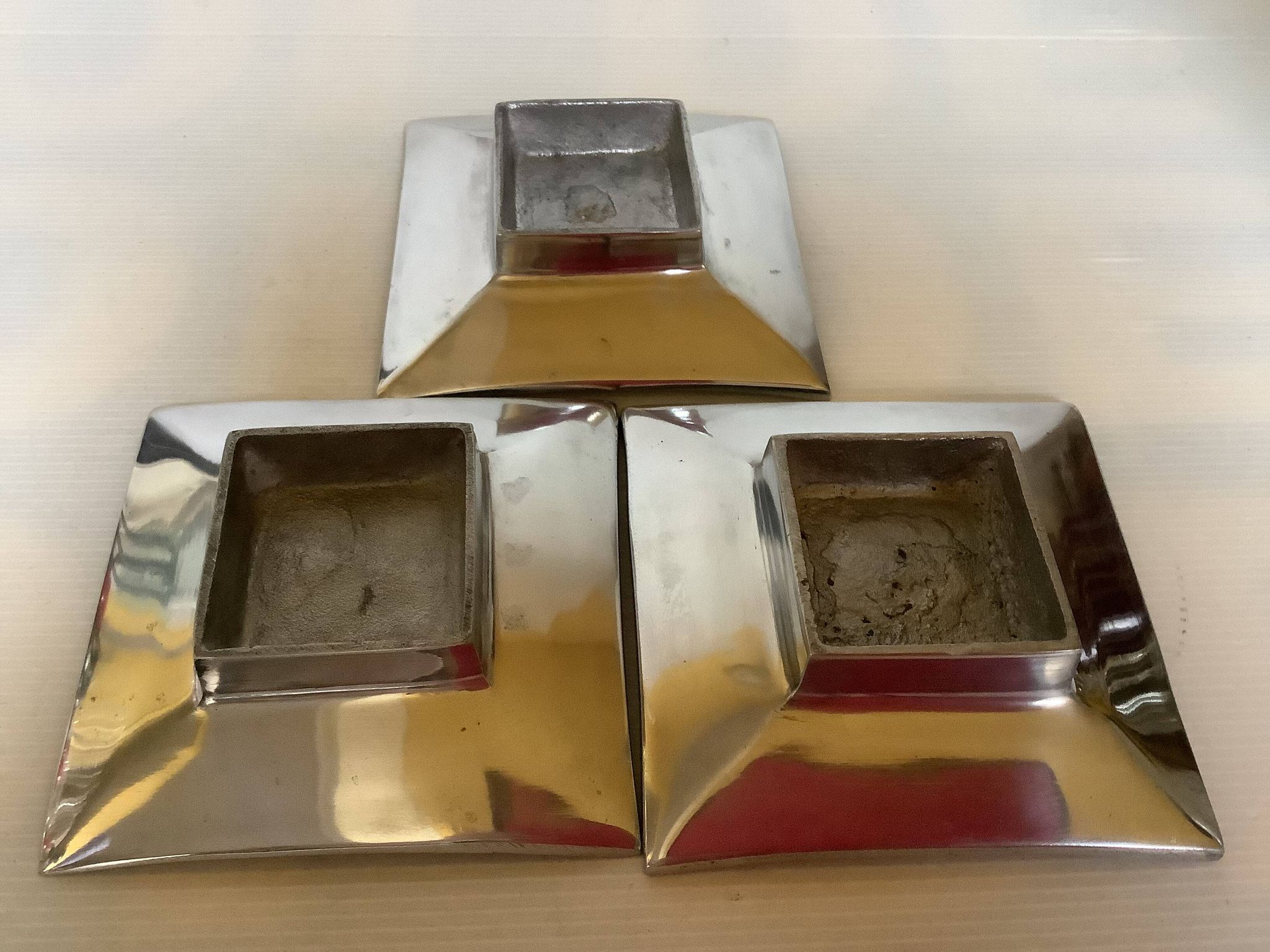 Three silver-plated metal trinket trays/candle holders