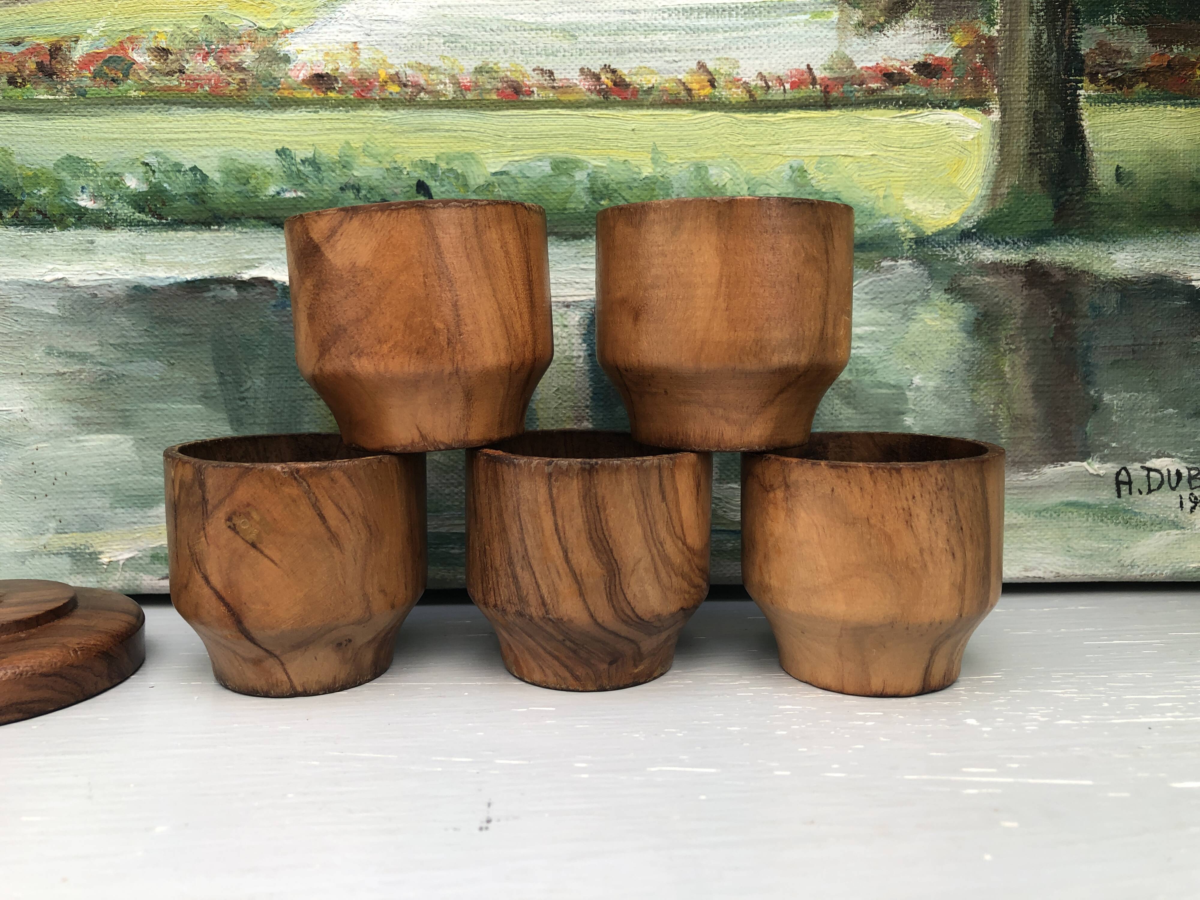 Five olive wood egg cups