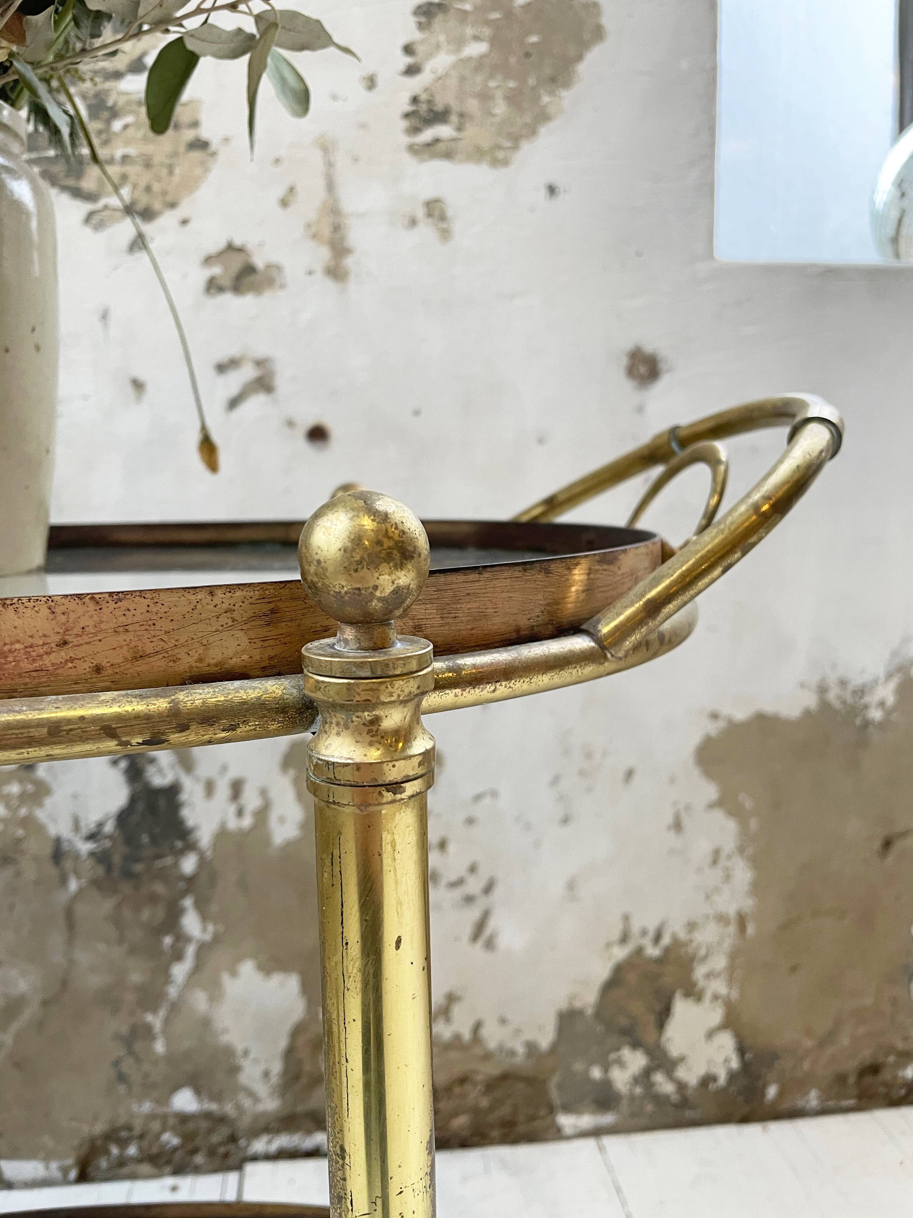 Cart serves brass bar