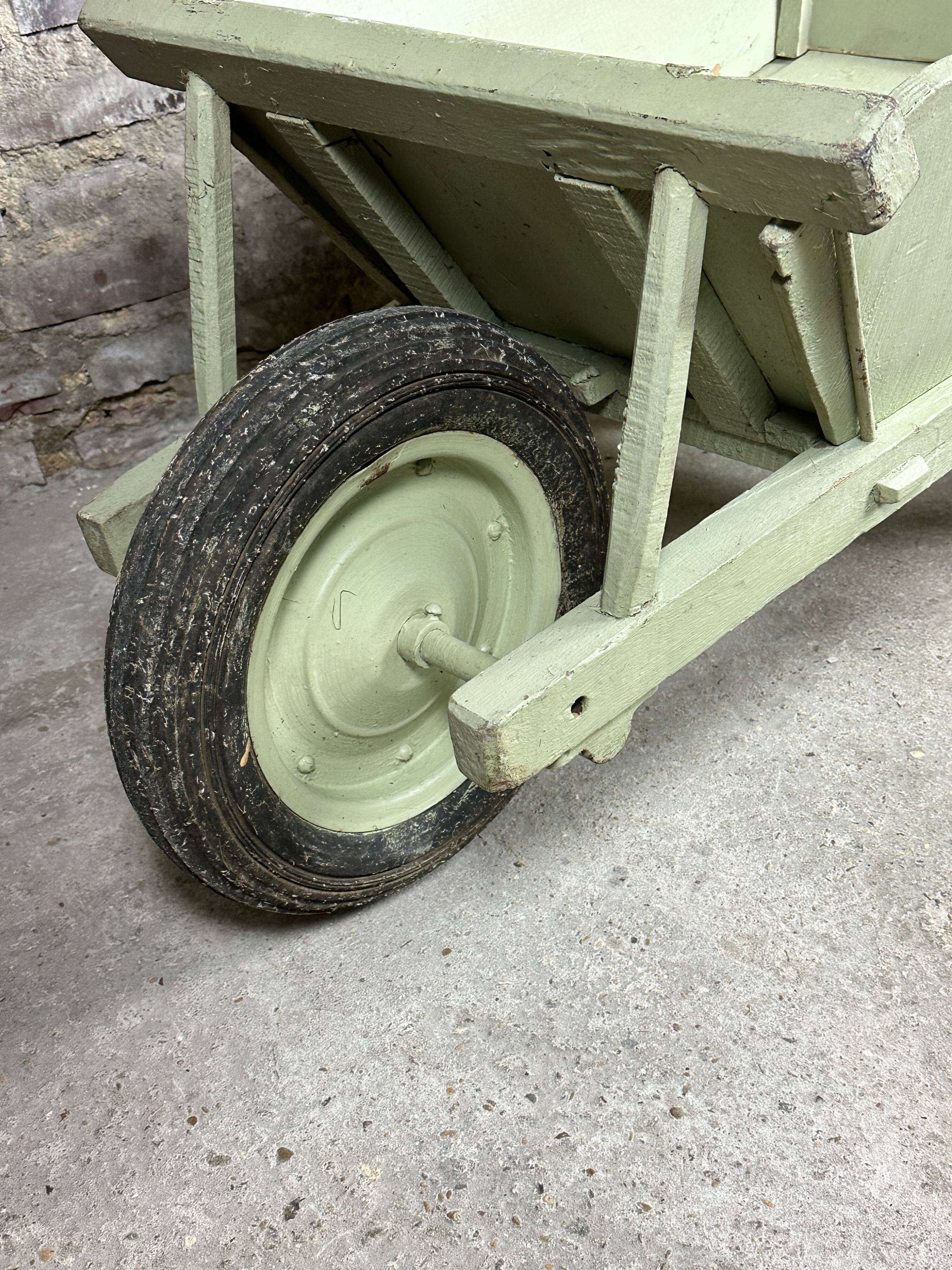 Antique wooden wheelbarrow
